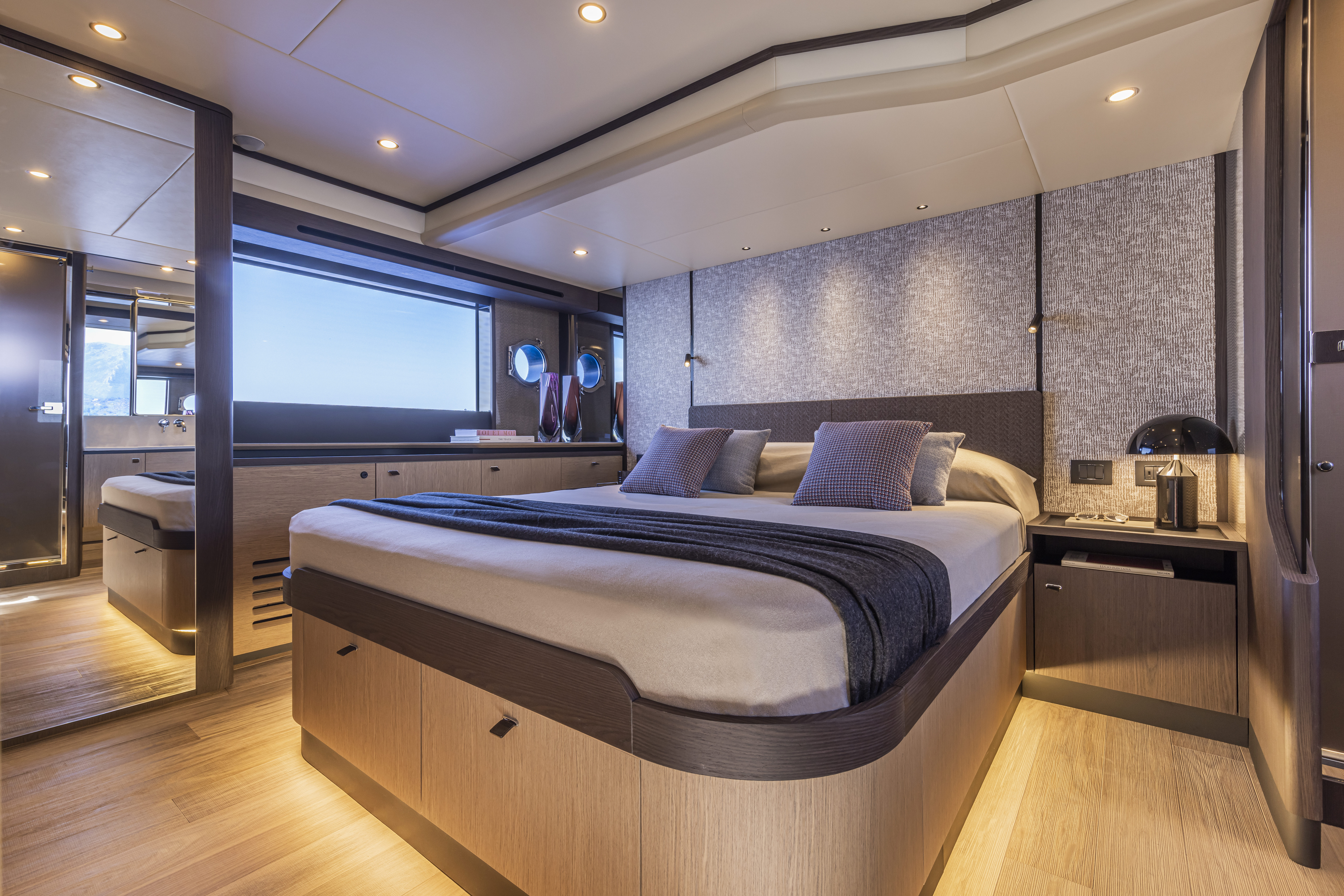 56 FLY flybridge helm — carbon dash, MFDs, sea view