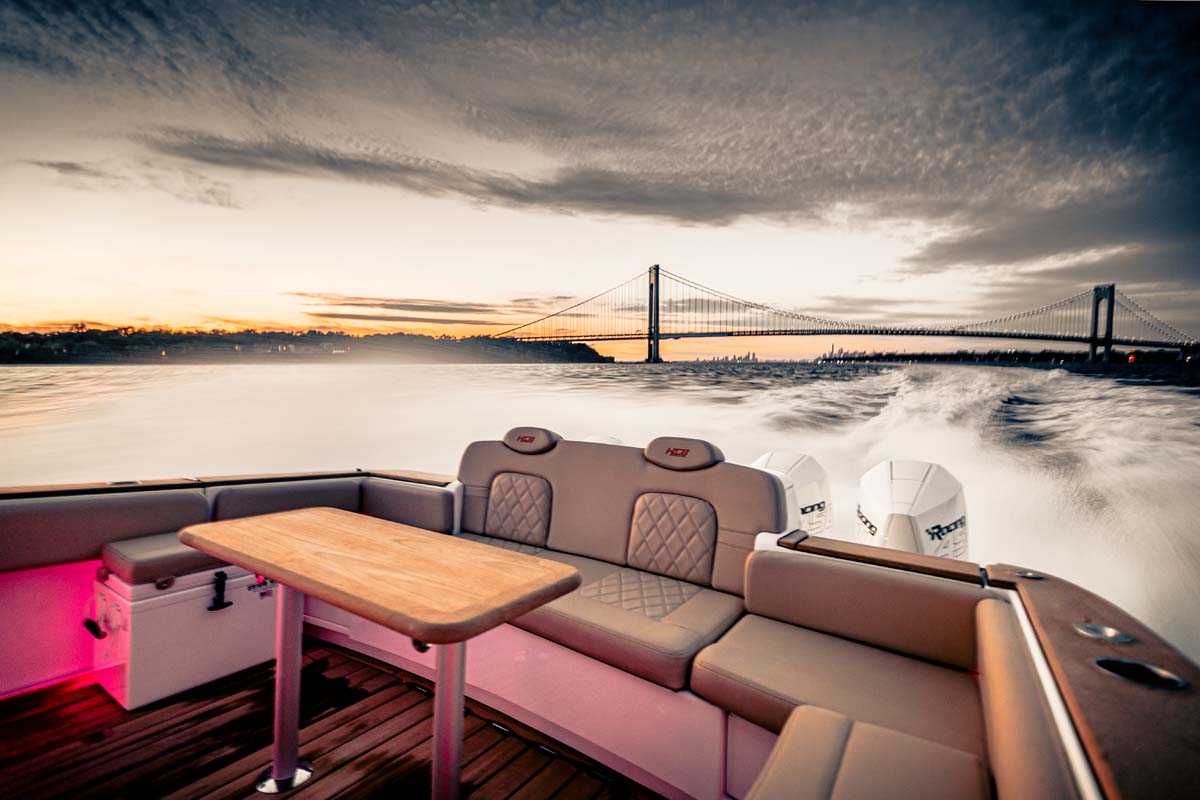 HCB 42 Lujo — helm view, navy hardtop, MFD array, bridge