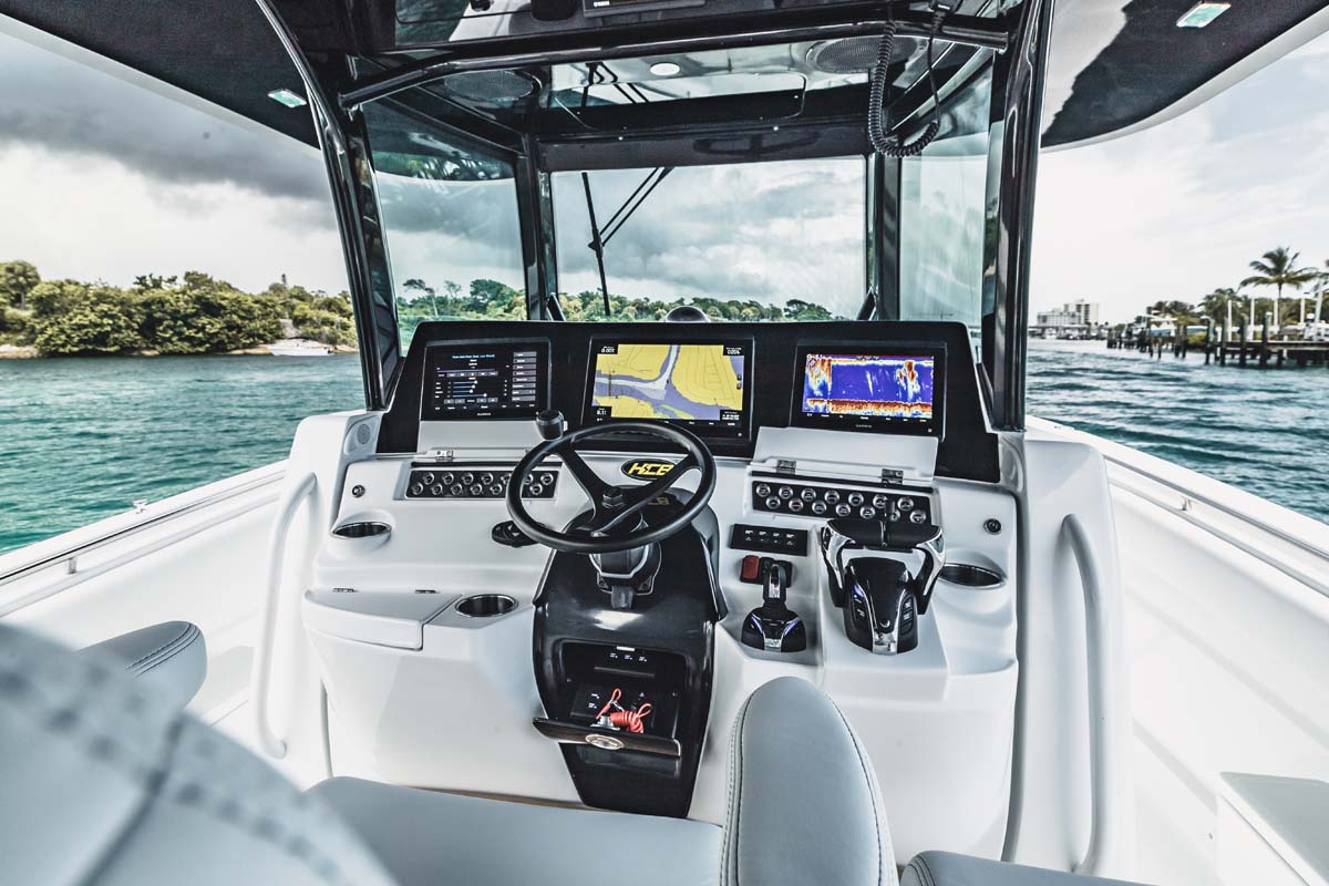 HCB 42 Lujo — bow lounge looking aft toward helm, Jupiter inlet