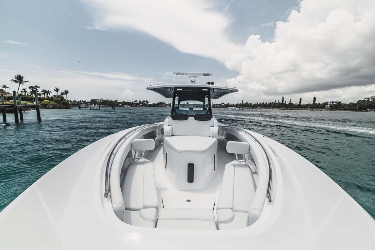 HCB 42 Lujo — forward cockpit, teal water, Palm Beach