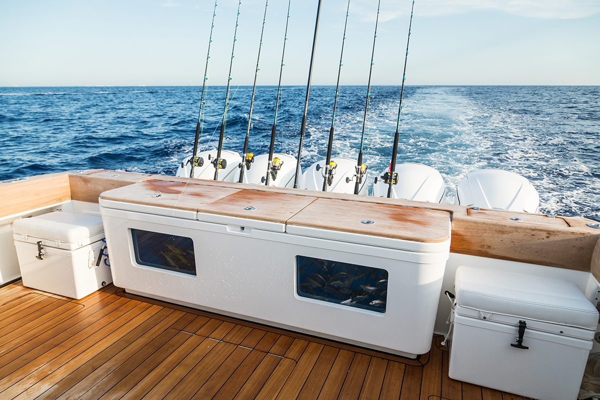 HCB 65 Estrella — bow lounge looking aft, teak accents, white upholstery, Palm Beach waterway