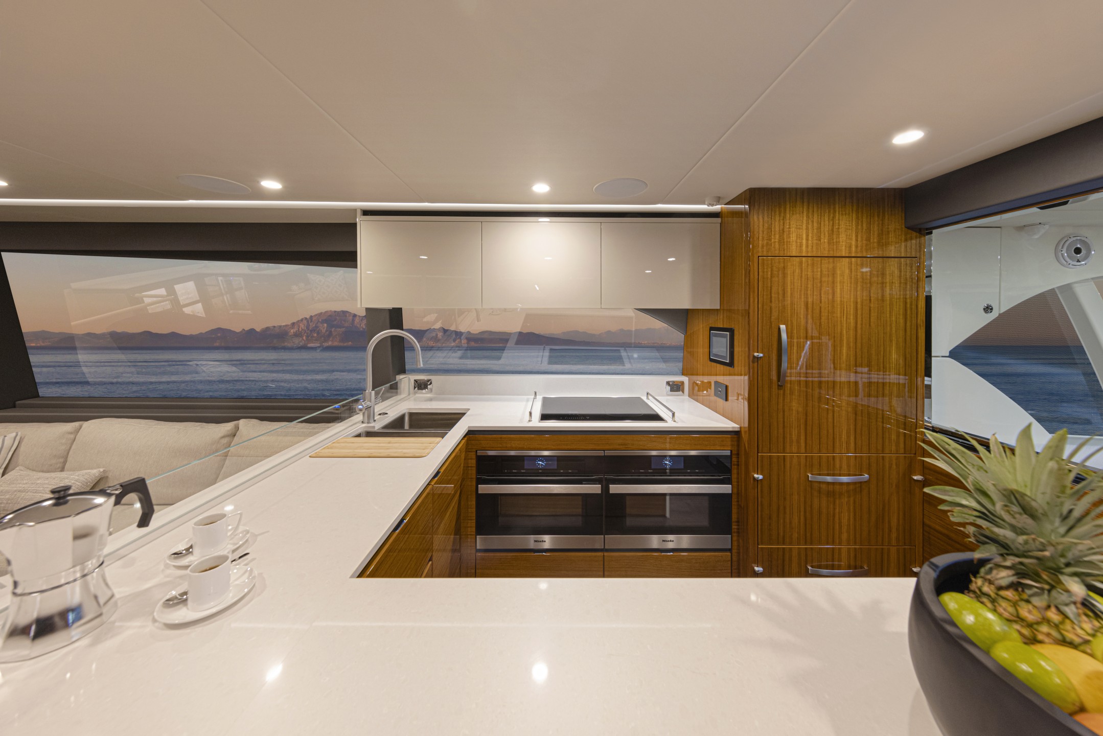 Riviera 78 MY – Riviera 78 Motor Yacht Galley   Gloss Teak Timber Finish 01
