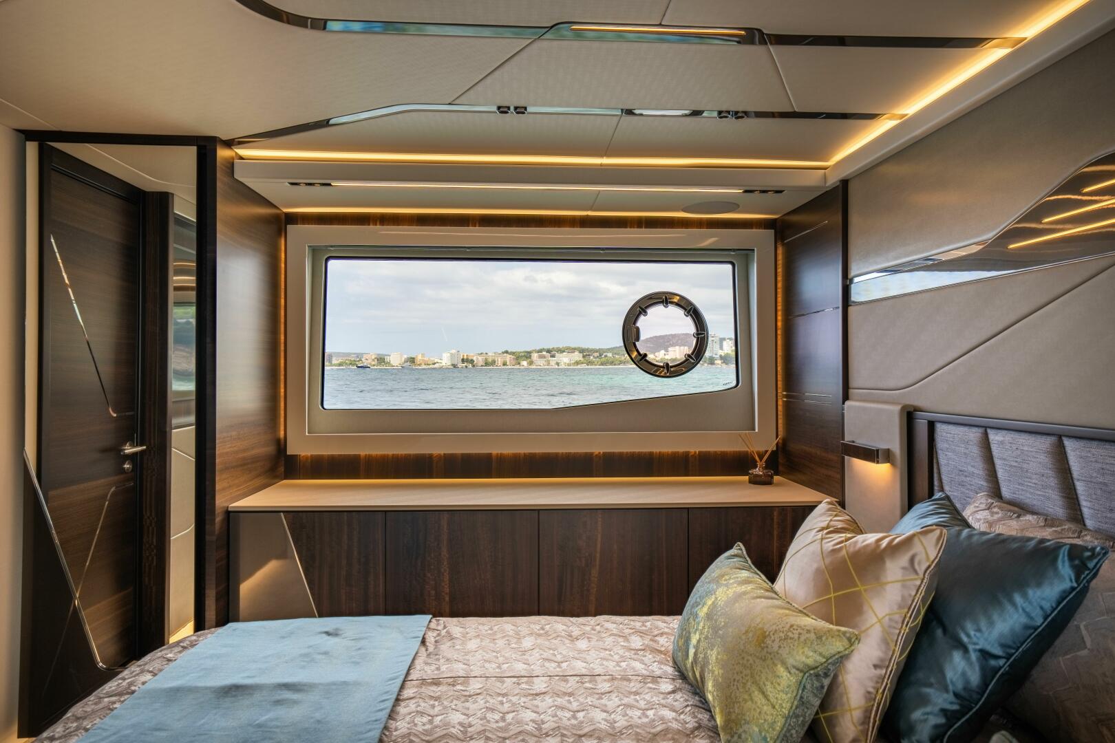 65 Sport Yacht — sunpad over garage, aft view