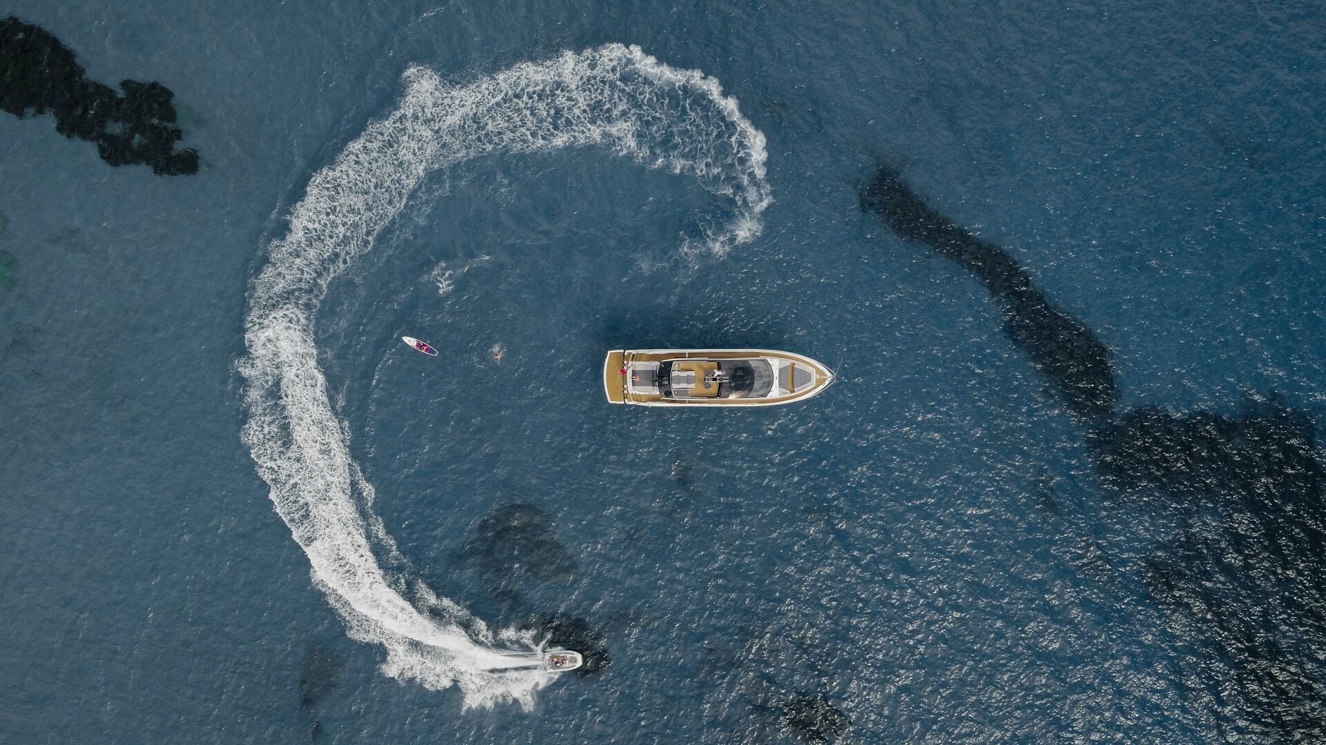 65 Sport Yacht — running, spray, Dorset coast