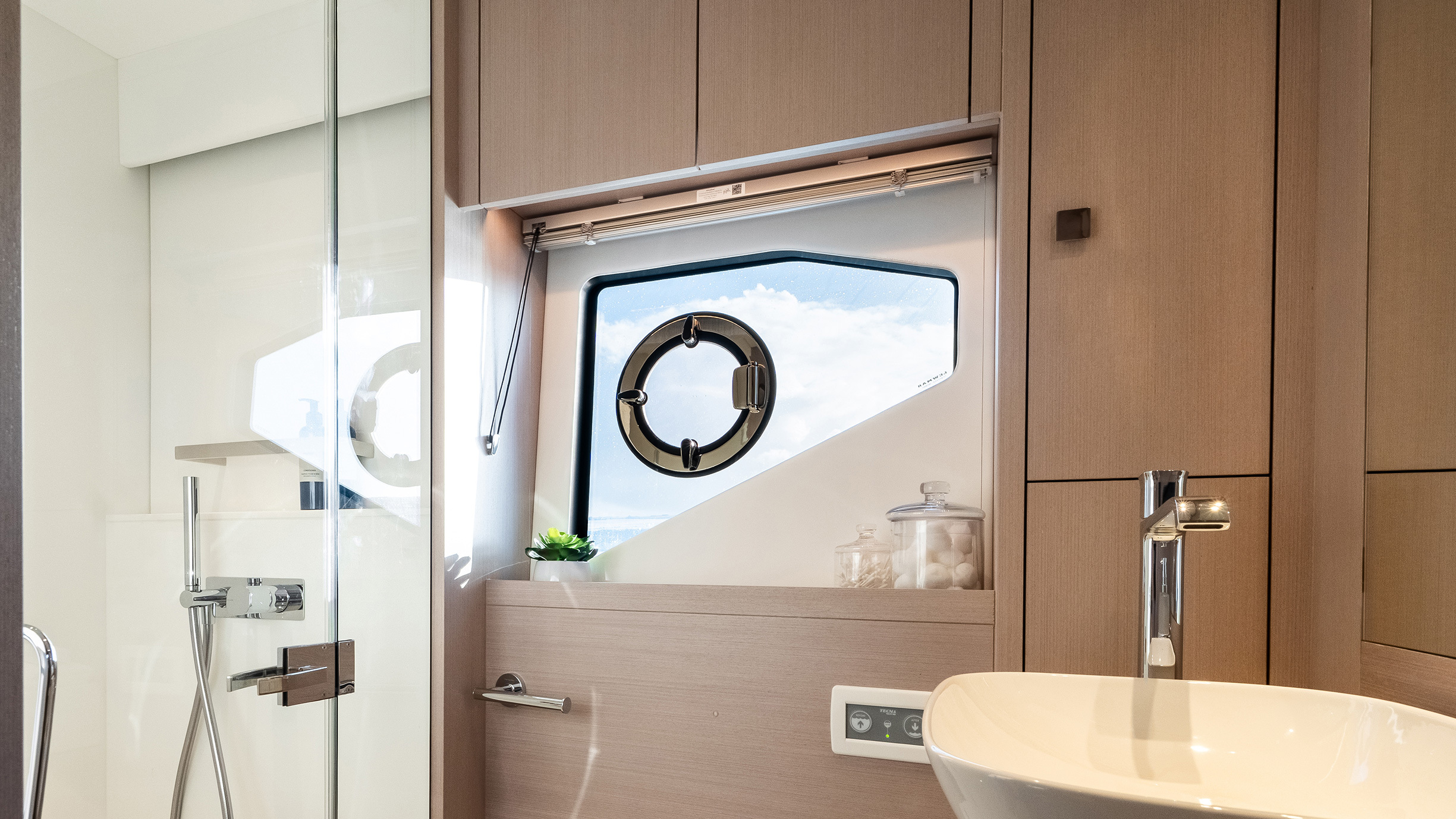 Sunseeker Manhattan 56 — helm side angle, Simrad chartplotter, bridge view, Poole Harbour