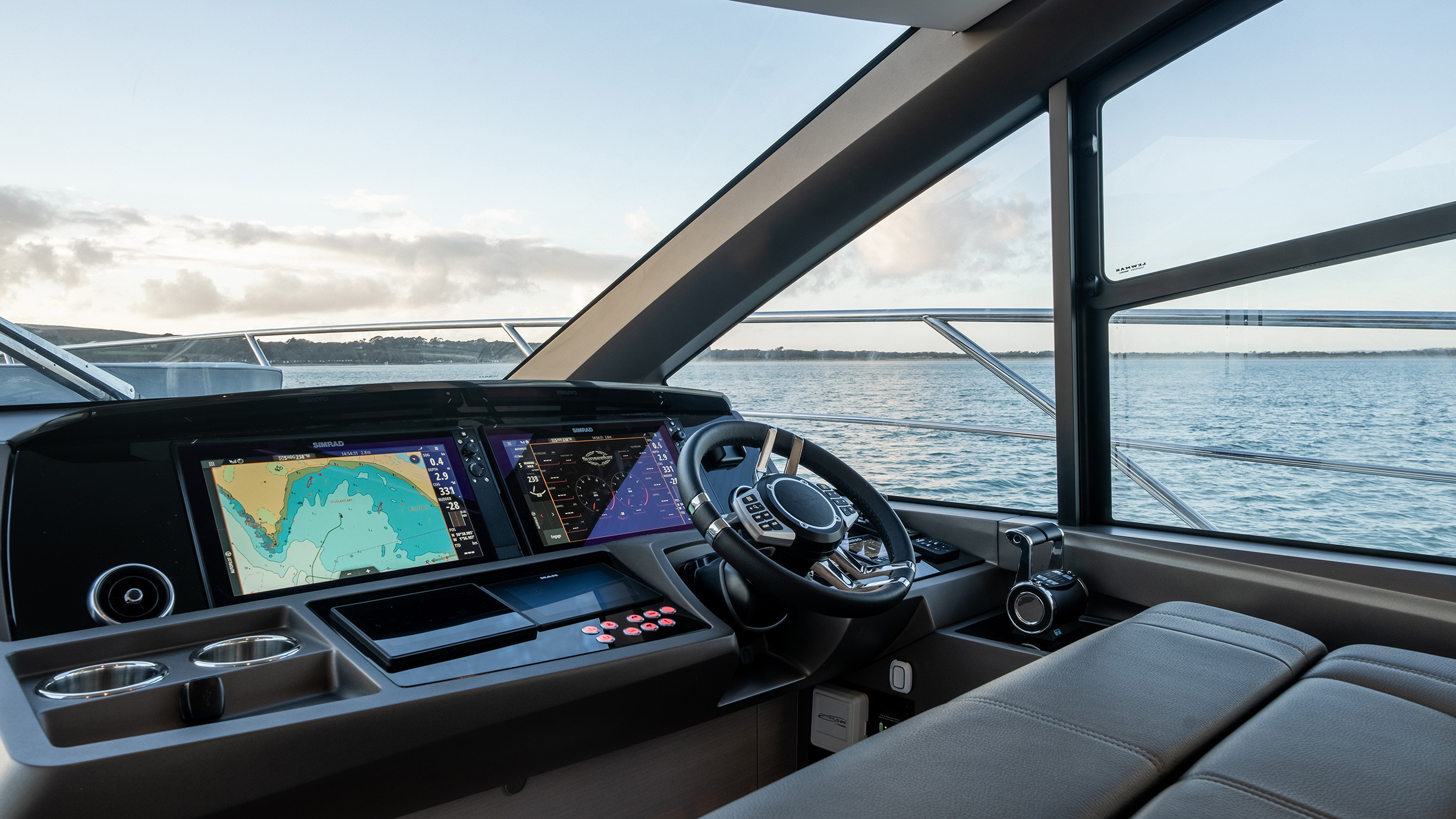Sunseeker Manhattan 56 — VIP cabin side, angular window detail, books on shelf