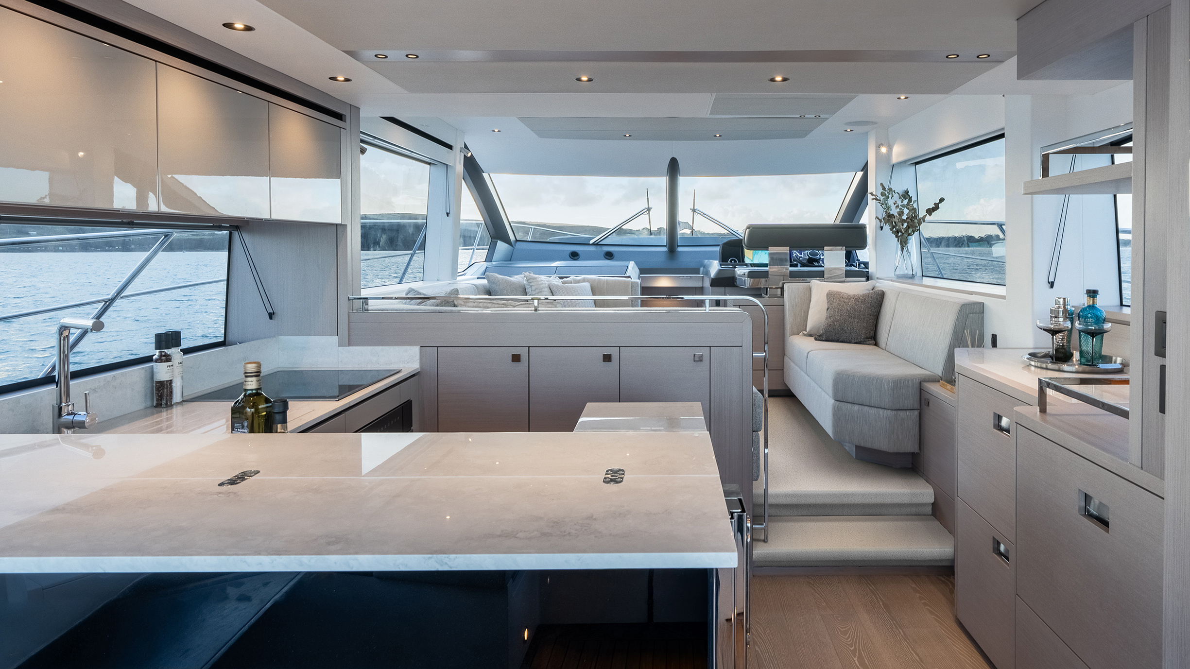 Sunseeker Manhattan 56 — galley island looking aft through to saloon and helm