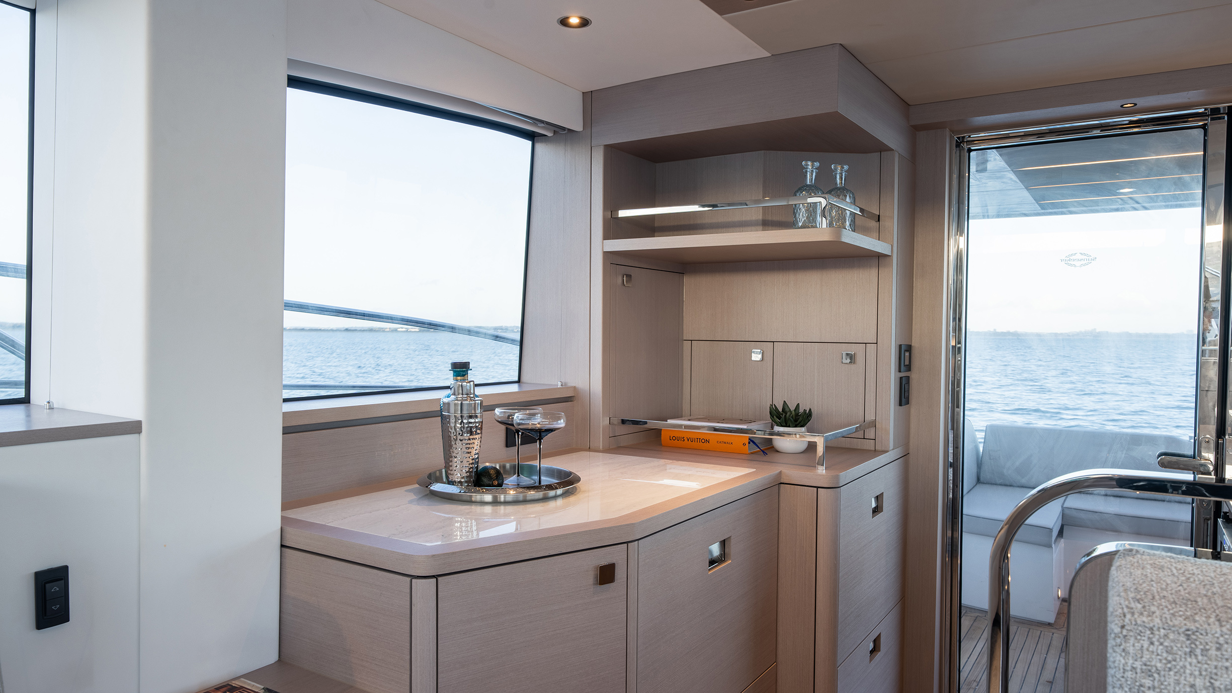 Sunseeker Manhattan 56 — drinks and bar unit, illuminated shelving, open to cockpit