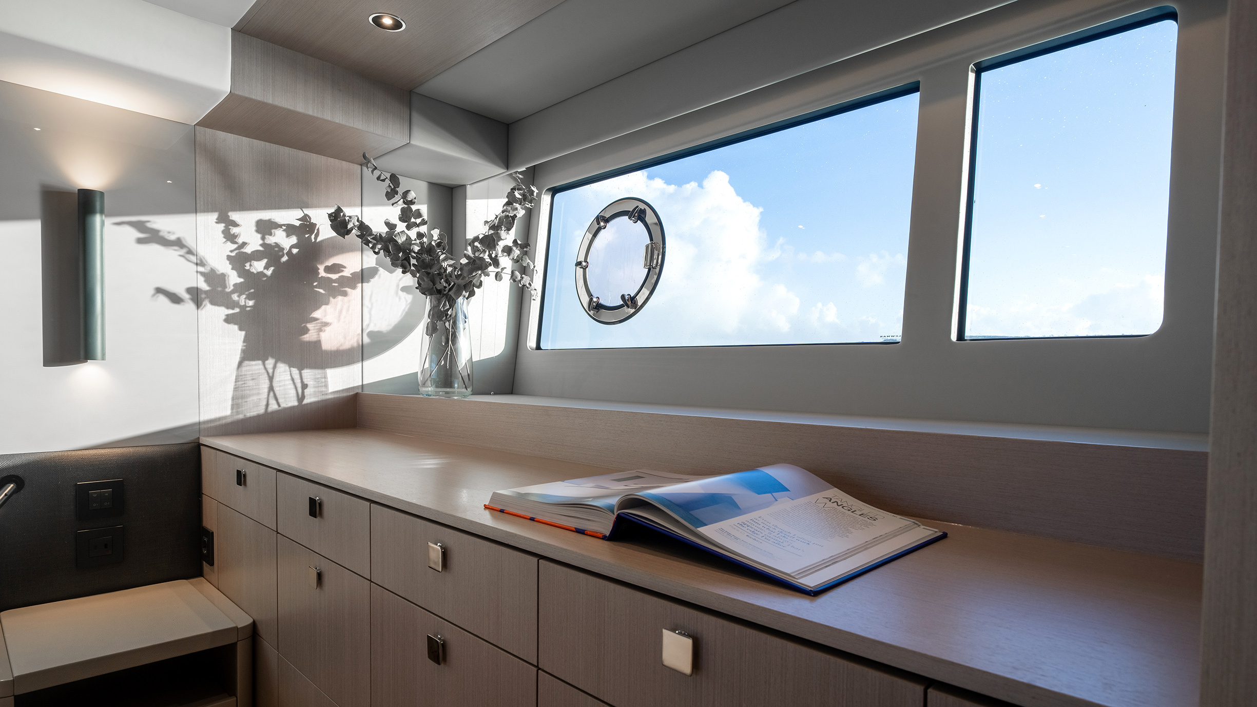Sunseeker Manhattan 56 — master vanity and storage area, panoramic window, blue sky