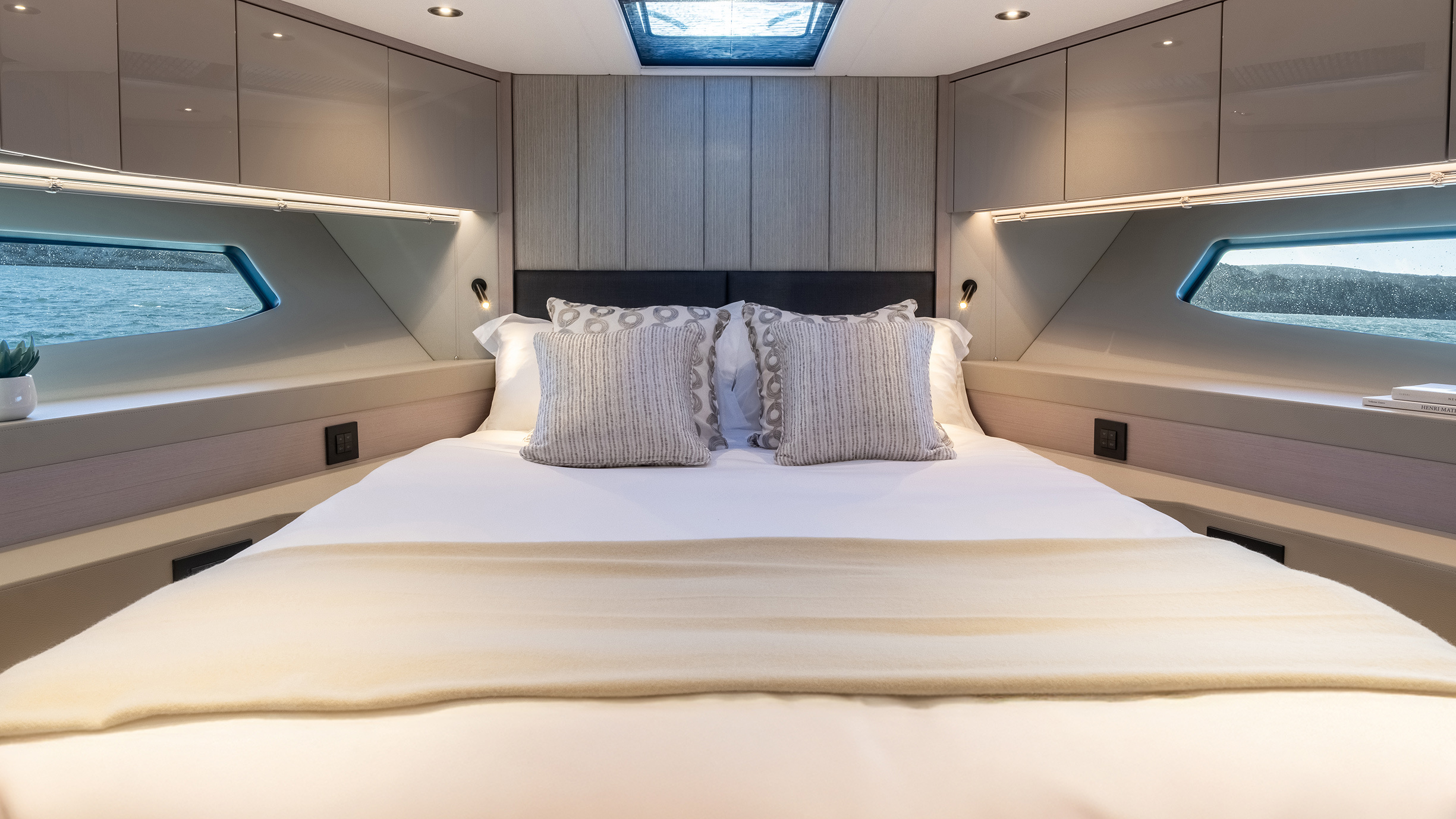 Sunseeker Manhattan 56 — VIP cabin face-on, skylight, angular hull windows both sides