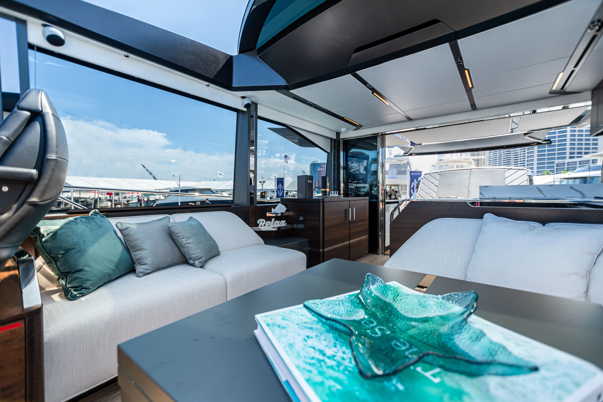 Predator 65 — port bow running hard, spray, Dorset