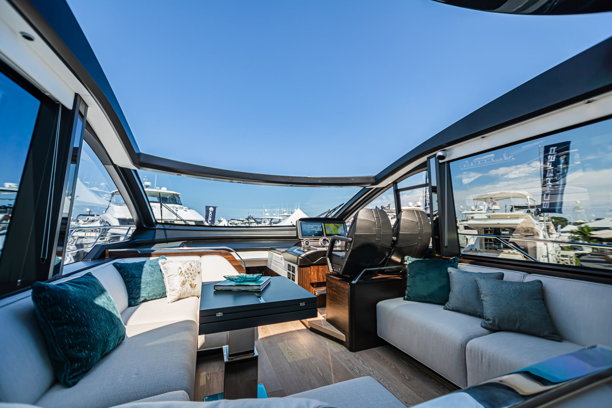 Predator 65 — full starboard silhouette at anchor, golden hour