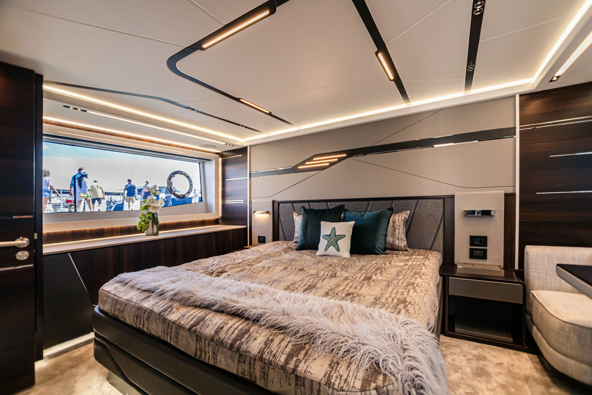 Predator 65 — sunroof open, wide helm view, sky above