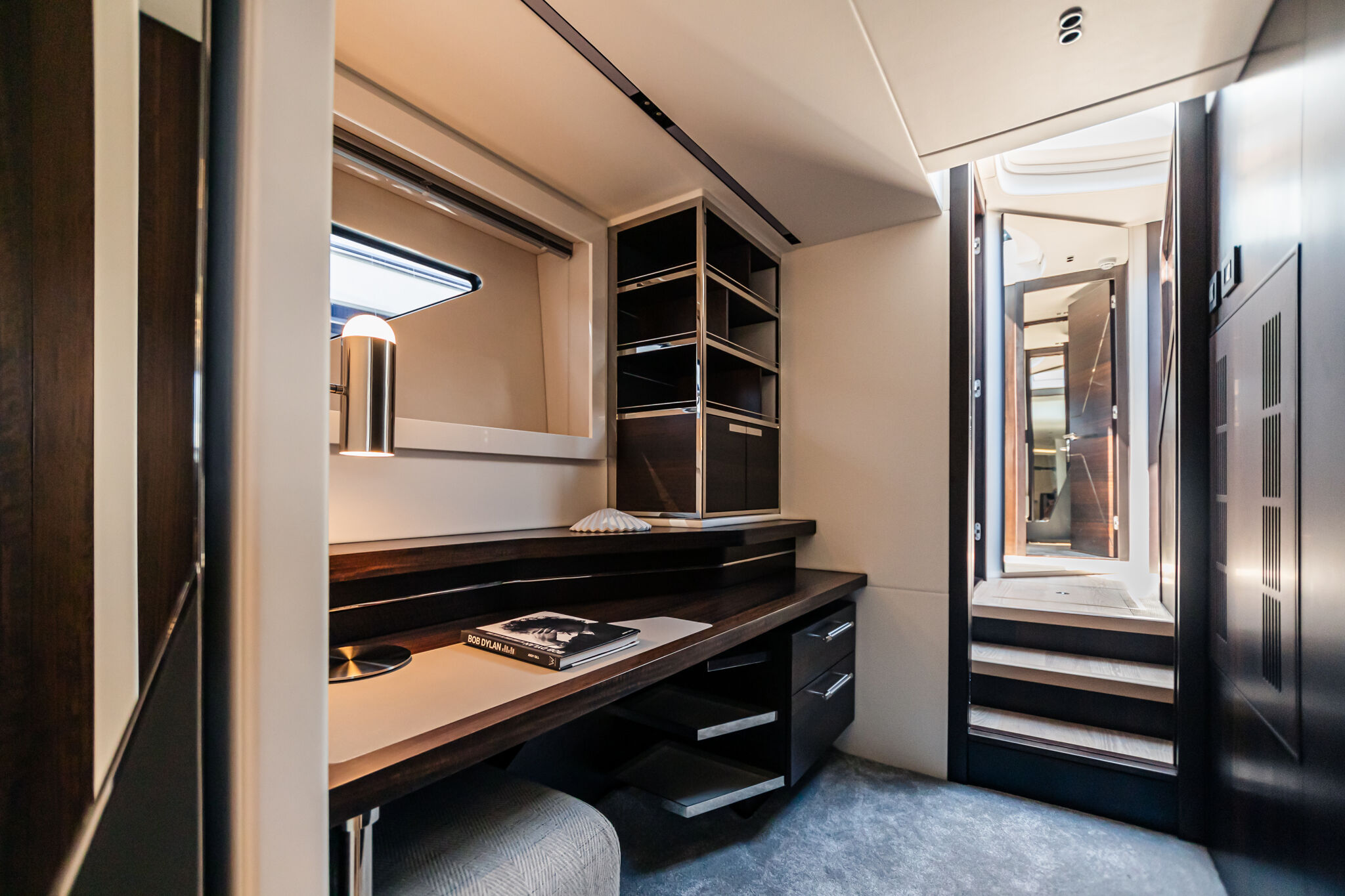 Predator 65 — main deck saloon panoramic views, C-shaped sofa, full glazing