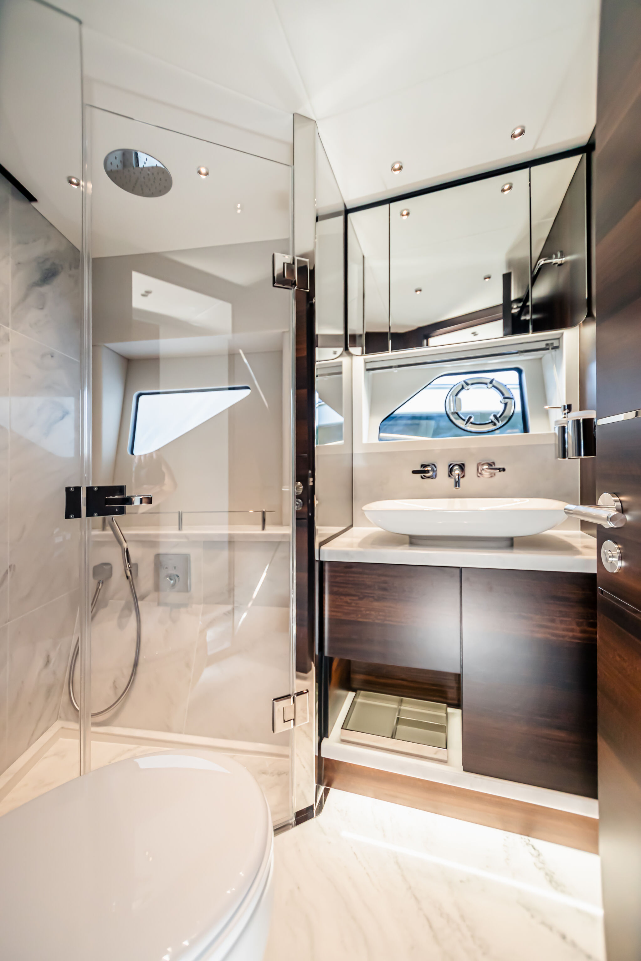 Predator 65 — saloon dining and seating area, looking aft to cockpit