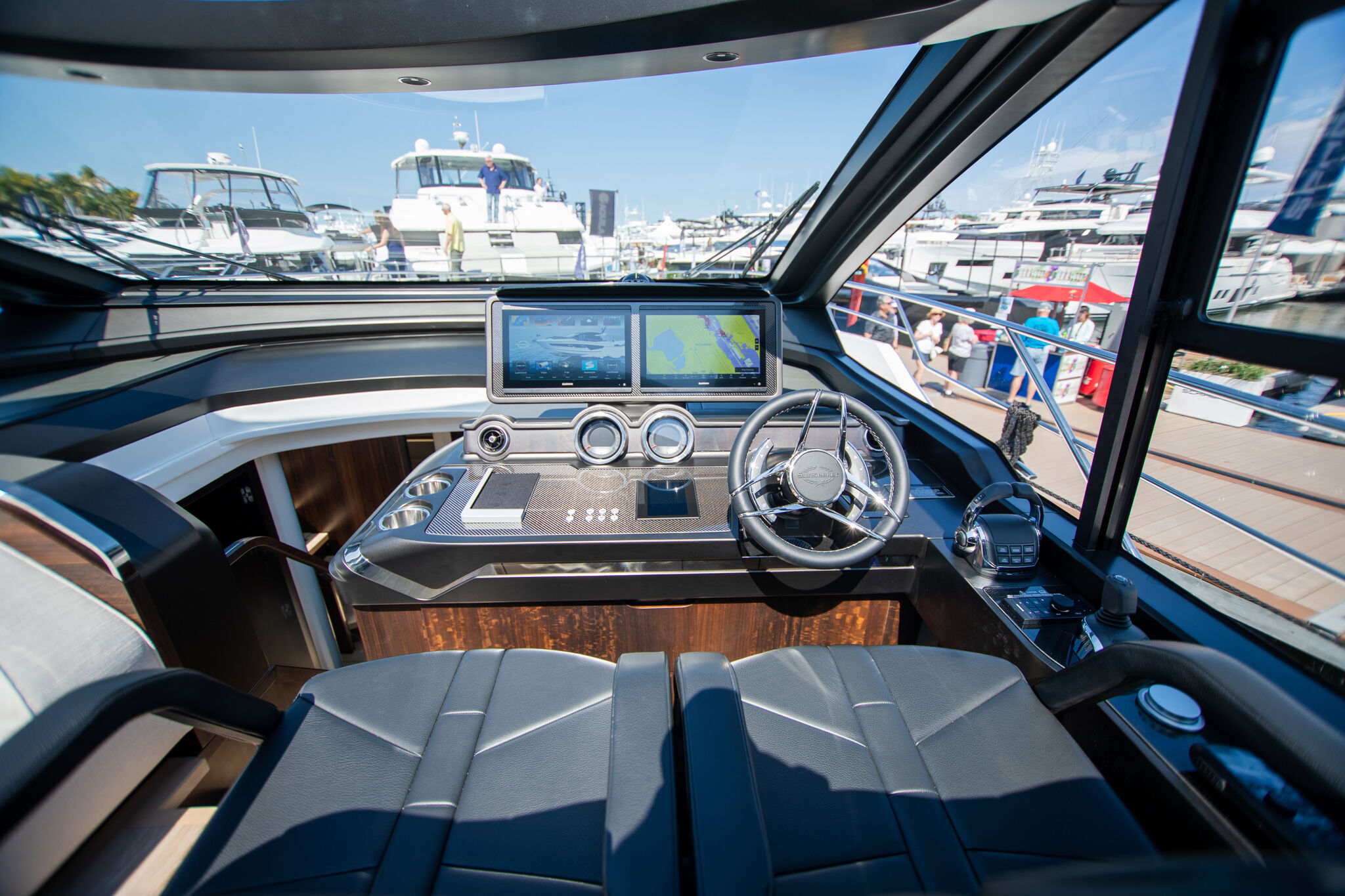 Predator 65 — cockpit open to beach club, bathing platform at water level