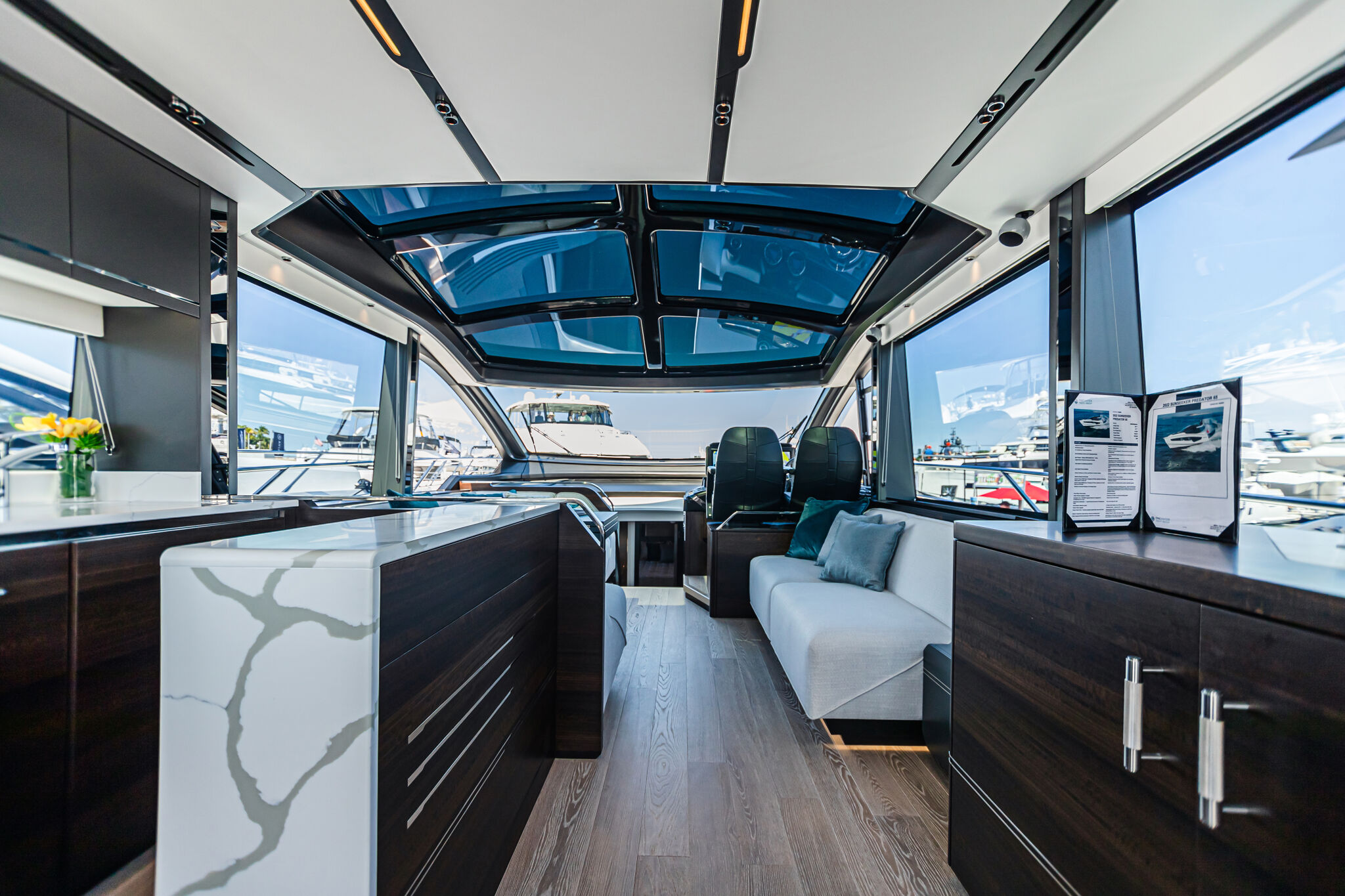 Predator 65 — VIP forward cabin, hull windows, natural light