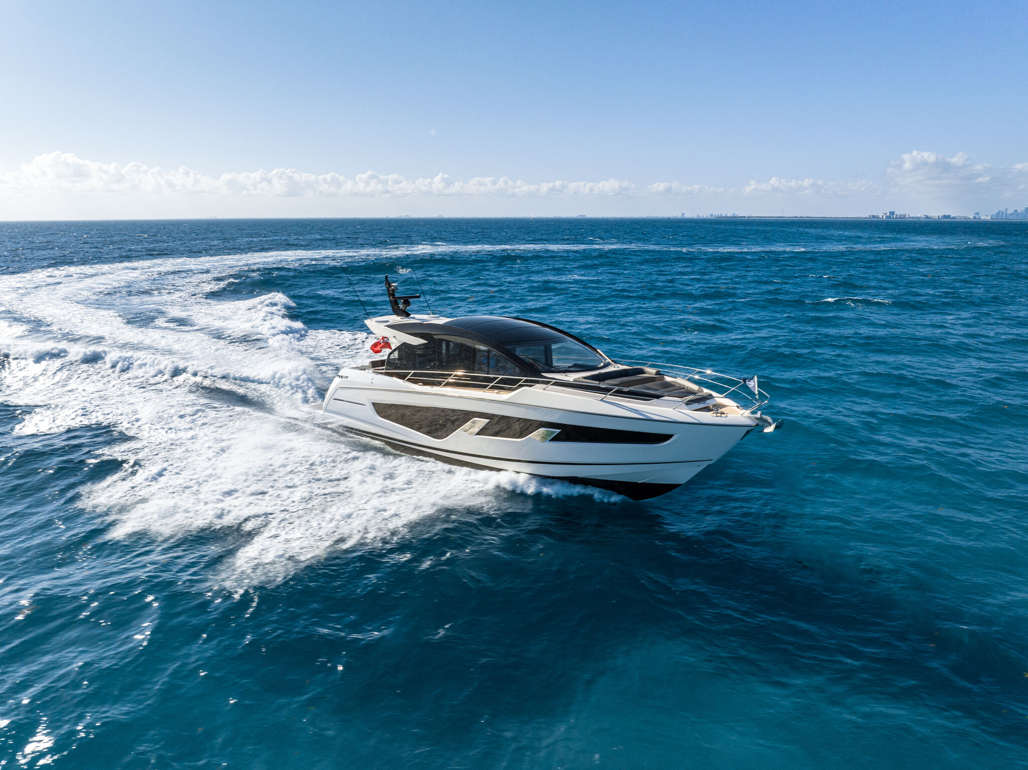 Predator 65 — diagonal hydraulic bathing platform deploying, tender on rollers
