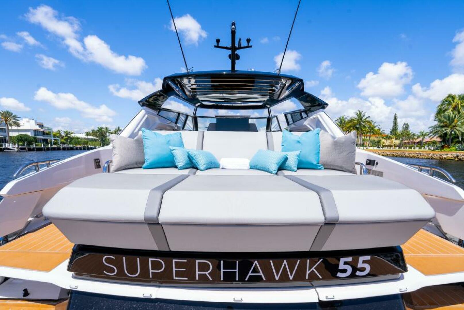 Sunseeker Superhawk 55 — cockpit facing forward, TV raised, wet bar island