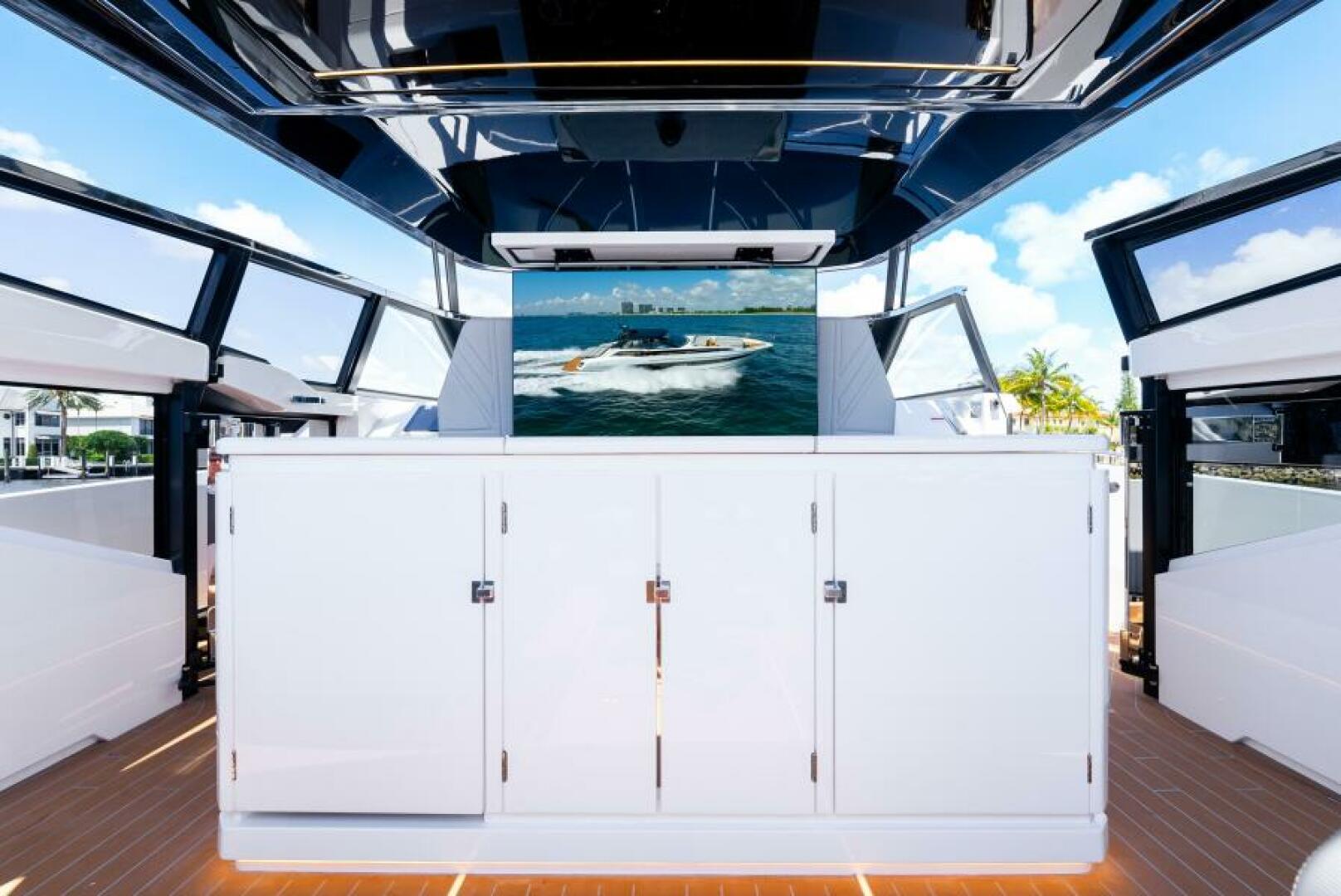 Sunseeker Superhawk 55 — transom name close, teak platform, intracoastal