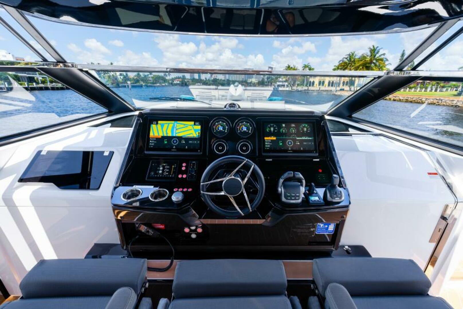 Sunseeker Superhawk 55 — aft cockpit looking forward to helm, intracoastal